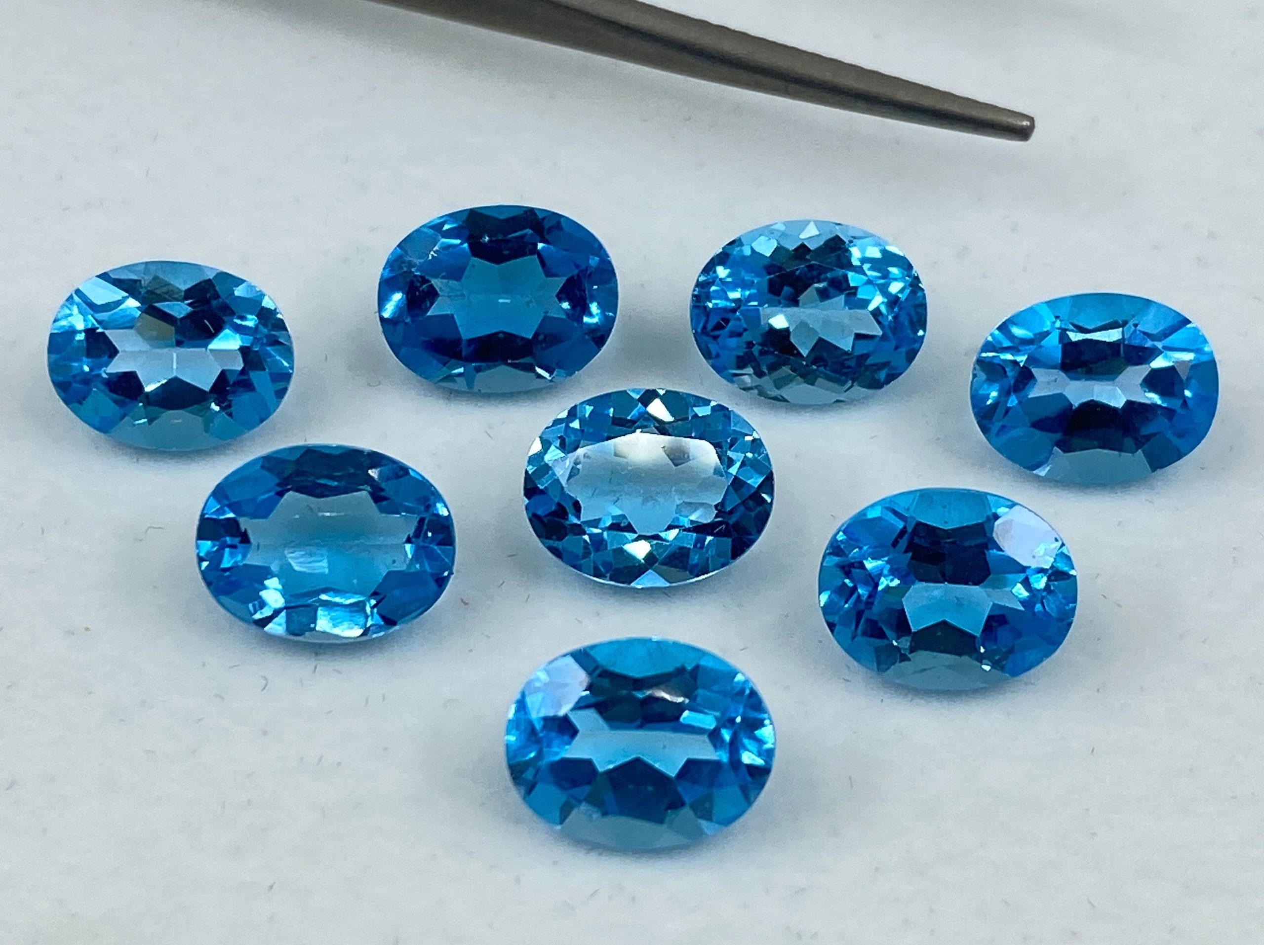 il fullxfull.3121165278 29q1 scaled Swiss Blue Topaz Faceted Oval Shape Loose Gemstones in Assorted Sizes Ranging from 4x3mm to 18x13mm for Jewellery Making