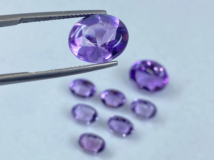 il fullxfull.3124225146 qt1p scaled Amethyst (Brazilian) Buff Top Oval Loose Gemstones in Assorted Sizes Ranging from 7x5mm to 12X10mm for Jewellery Making