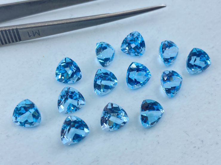 il fullxfull.3138499416 jw58 scaled Sky Blue Topaz Faceted Trillion Shape Loose Gemstones In 6mm, 7mm & 10mm For Jewellery Making