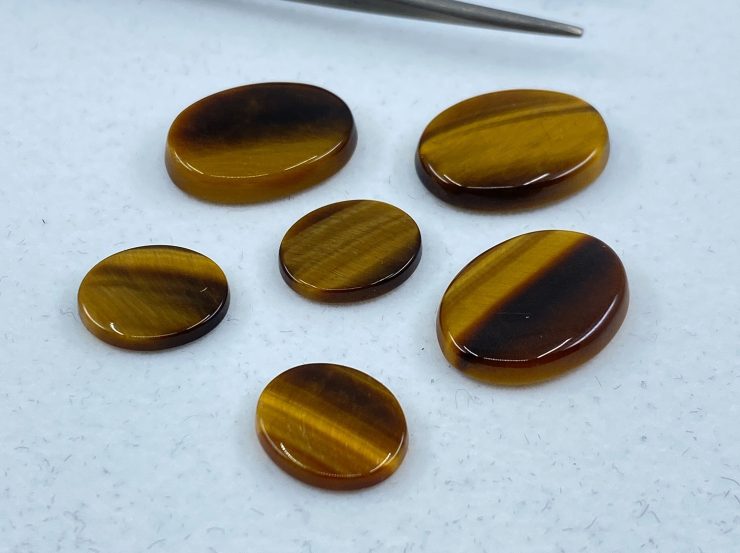 il fullxfull.3138782576 p8h5 scaled Golden Tiger Eye Single Bevel Buff Top (SBBT) Oval Loose Gemstones In Assorted Sizes Ranging From 6x4mm To 20x15mm For Jewellery Making