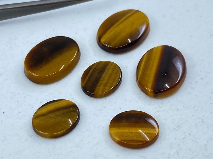 il fullxfull.3138782682 9t3o scaled Golden Tiger Eye Single Bevel Buff Top (SBBT) Oval Loose Gemstones In Assorted Sizes Ranging From 6x4mm To 20x15mm For Jewellery Making