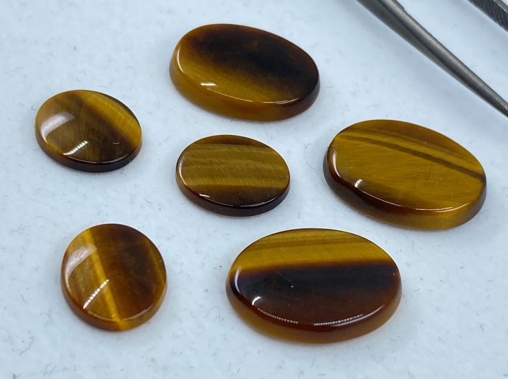 il fullxfull.3138782748 767z scaled Golden Tiger Eye Single Bevel Buff Top (SBBT) Oval Loose Gemstones In Assorted Sizes Ranging From 6x4mm To 20x15mm For Jewellery Making