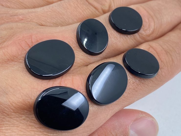 il fullxfull.3161547458 8ucn scaled Black Onyx Single Bevel Buff Top (SBBT) Oval Shape Loose Gemstones in Sizes Ranging from 6x4mm to 25x18mm forJewellery Making