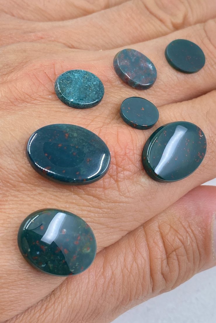 il fullxfull.3161587296 xno1 scaled Bloodstone Single Bevel Buff Top (SBBT) Oval Loose Gemstones In Assorted Sizes Ranging From 7x5mm To 25x18mm