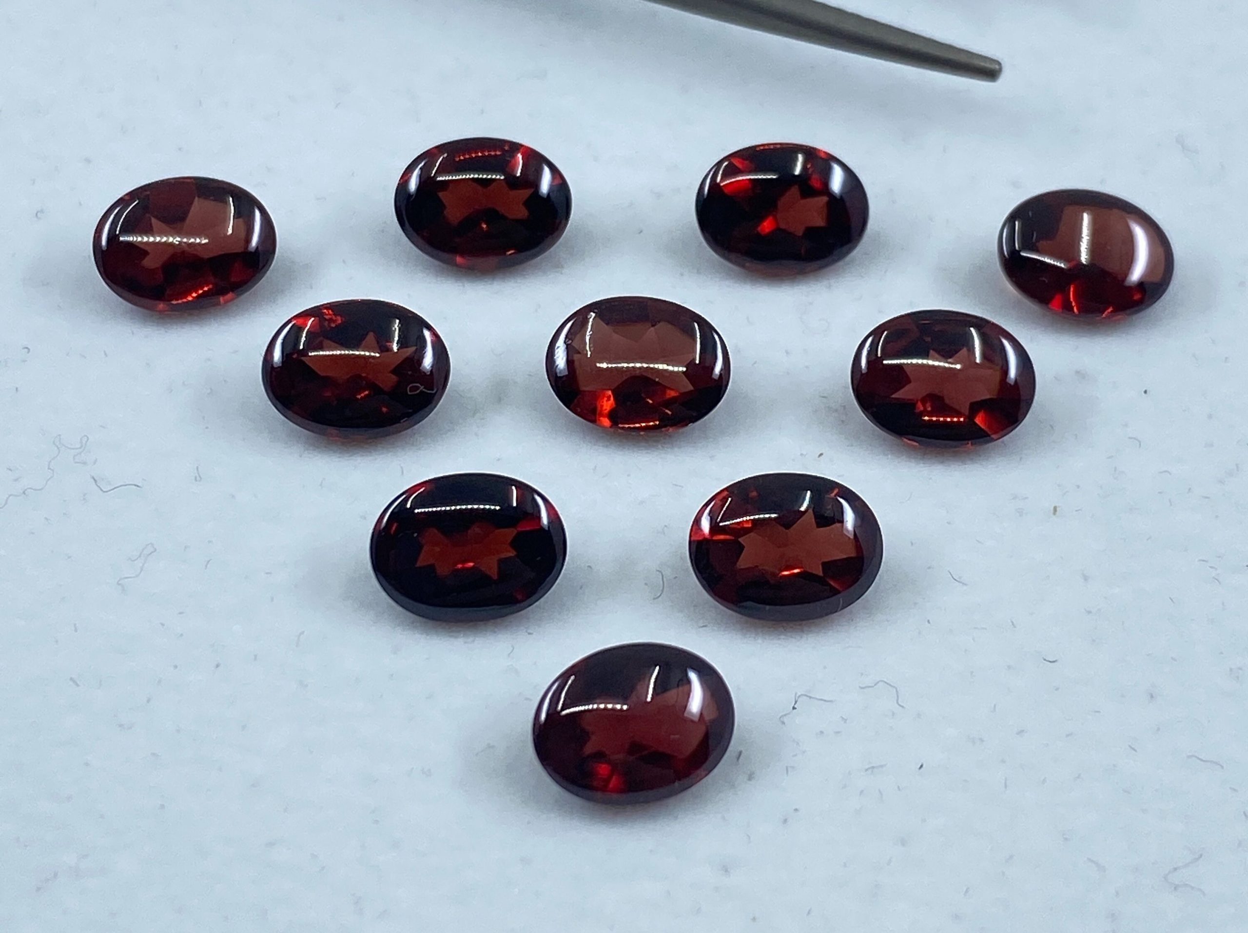 il fullxfull.3172012351 63e6 scaled Garnet (Mozambique) Buff Top Oval Loose Gemstones in 7x5mm, 8x6mm and 9x7mm for Jewellery Making