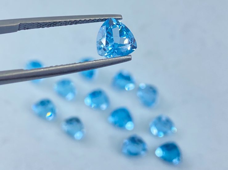 il fullxfull.3186222573 e9hj scaled Sky Blue Topaz Faceted Trillion Shape Loose Gemstones In 6mm, 7mm & 10mm For Jewellery Making