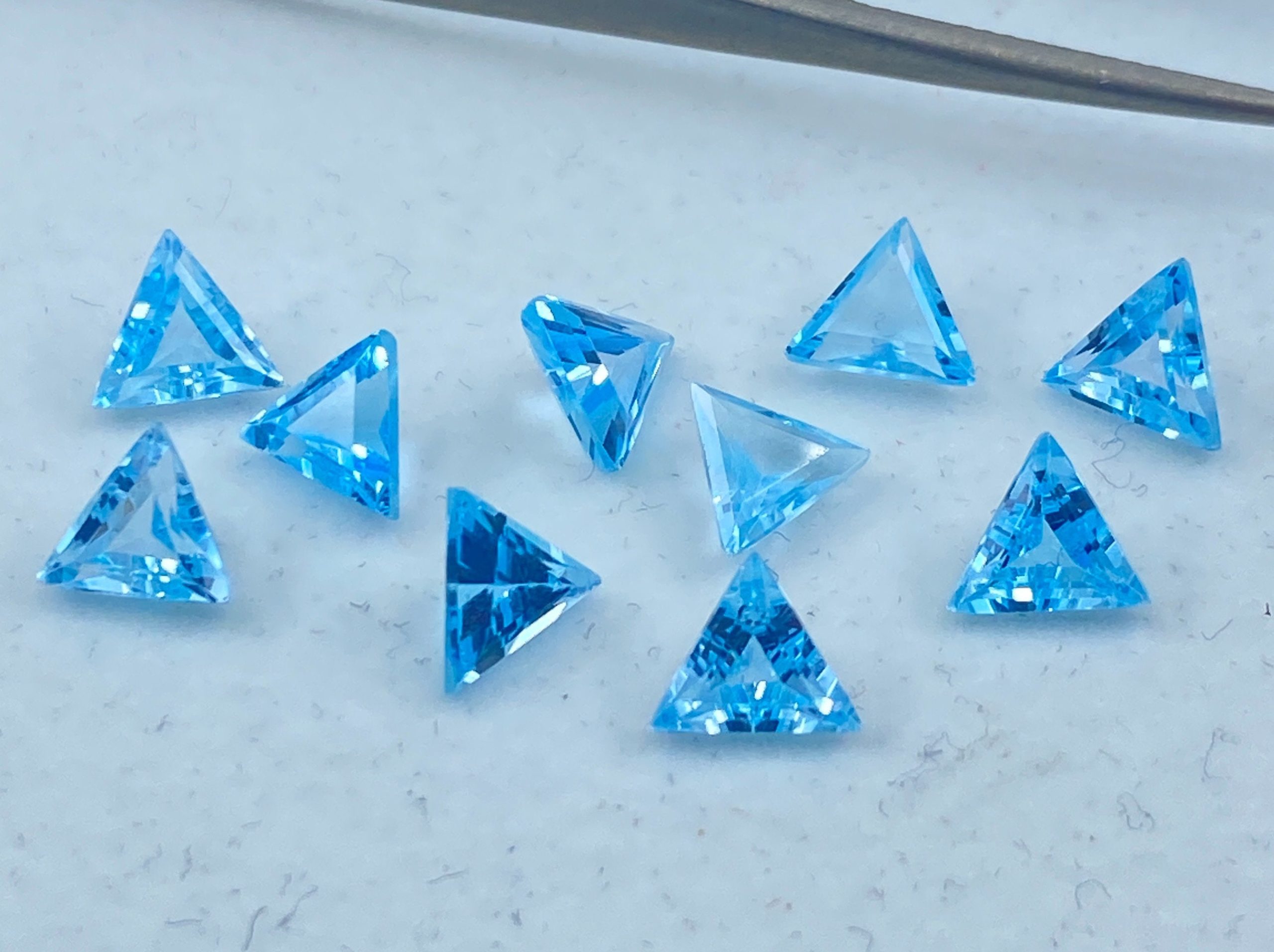 il fullxfull.3186233231 f9u9 scaled Sky Blue Topaz Faceted Triangle Shape Loose Gemstones in 5mm and 6mm for Jewellery Making