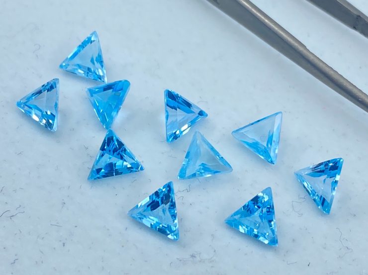 il fullxfull.3186233381 j3fq scaled Sky Blue Topaz Faceted Triangle Shape Loose Gemstones in 5mm and 6mm for Jewellery Making