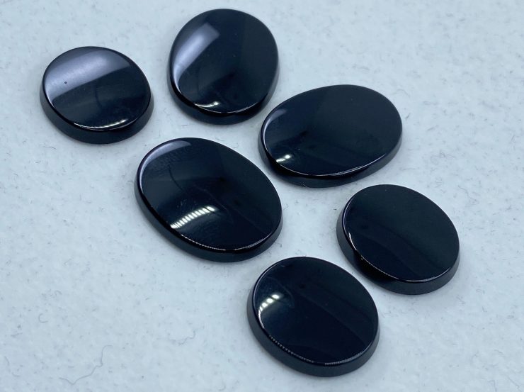 il fullxfull.3209261533 5cbp scaled Black Onyx Single Bevel Buff Top (SBBT) Oval Shape Loose Gemstones in Sizes Ranging from 6x4mm to 25x18mm forJewellery Making