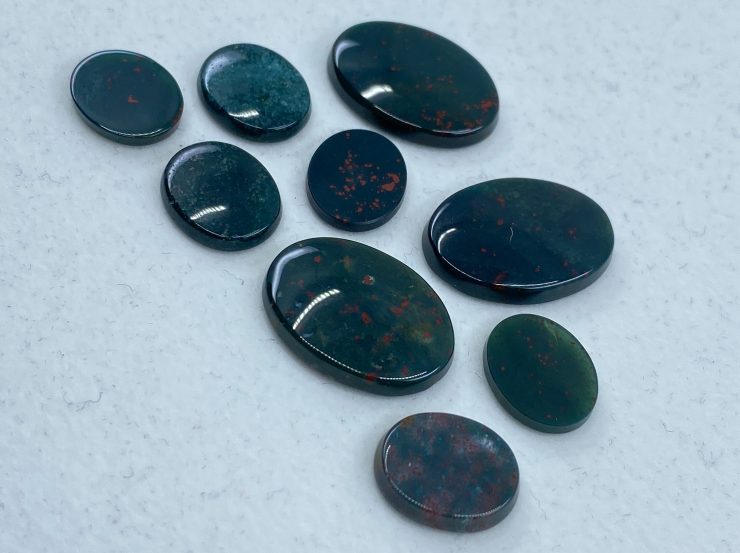 il fullxfull.3209301189 s6vd scaled Bloodstone Single Bevel Buff Top (SBBT) Oval Loose Gemstones In Assorted Sizes Ranging From 7x5mm To 25x18mm