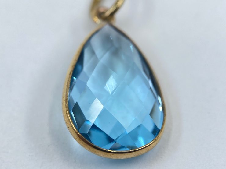 il fullxfull.3460102110 4xjr 1 scaled 9 Carat Gold Pendant with Pear Shape Sky Blue Topaz Gemstone (11 Carat) Measuring 18x12mm