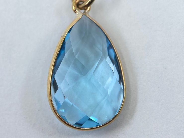 il fullxfull.3460102220 7wsw 1 scaled 9 Carat Gold Pendant with Pear Shape Sky Blue Topaz Gemstone (11 Carat) Measuring 18x12mm