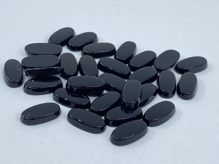 il fullxfull.3884594612 ociv scaled 30 Pieces of Black Onyx Single Bevel Buff Top (SBBT) Oval Shape Loose Gemstones in 9.5x5mm forJewellery Making