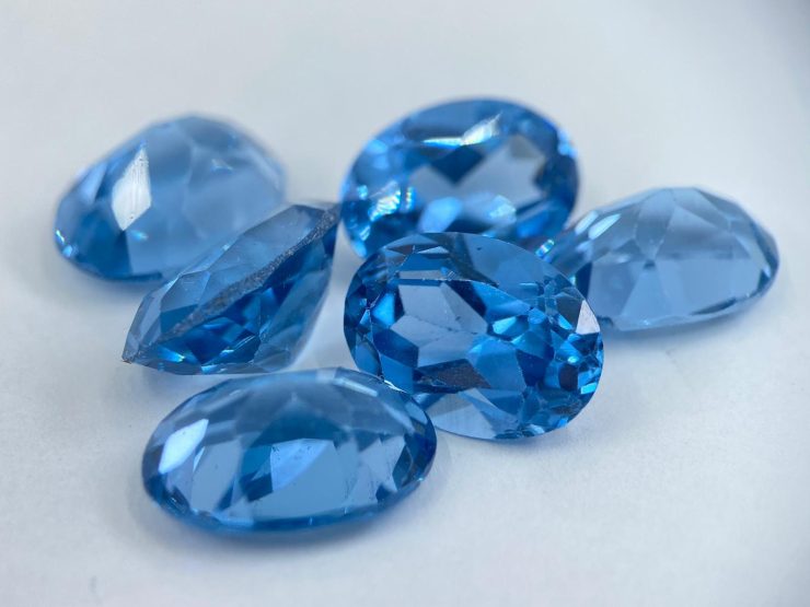 Lab-Created Aquamarine Corundum Oval Shape Faceted Loose Gemstones In 14x10mm For Jewellery Making