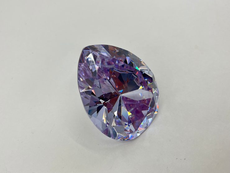 il fullxfull.5106563481 7opg scaled White-Purplish Cubic Zirconia Pear Shape Large Gemstone in 55x45mm for Jewellery Making