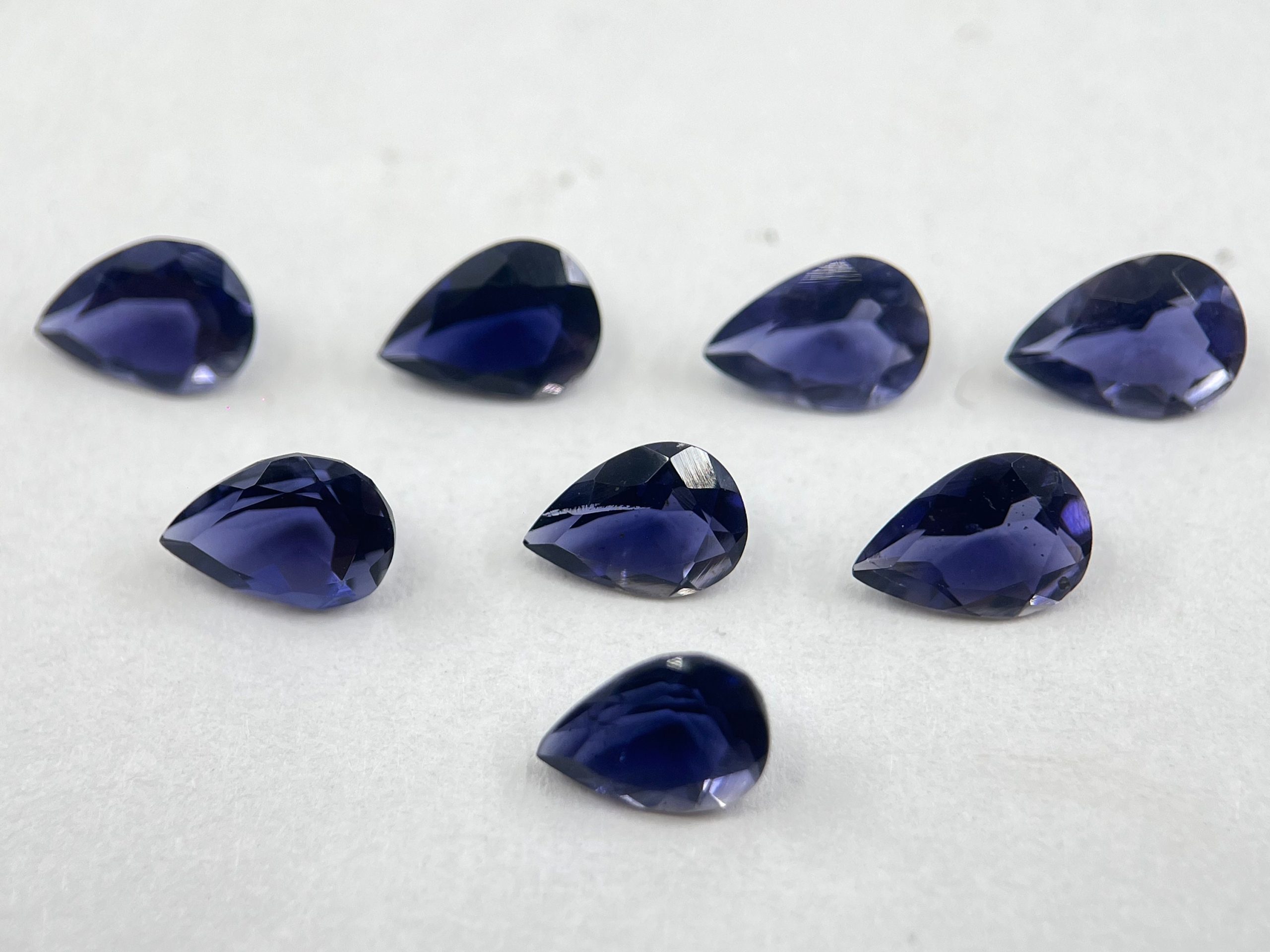 il fullxfull.5338067445 j49p scaled Iolite Pear Shapes Faceted Loose Gemstones in Assorted Sizes from 5x3mm to 9x6mm for Jewellery Making