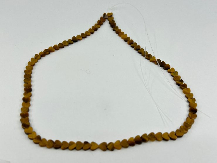 il fullxfull.5578441292 e2bn scaled Golden Tiger Eye 5mm Heart Shape Beads on 16 inch Temporary Strands for Jewellery Making