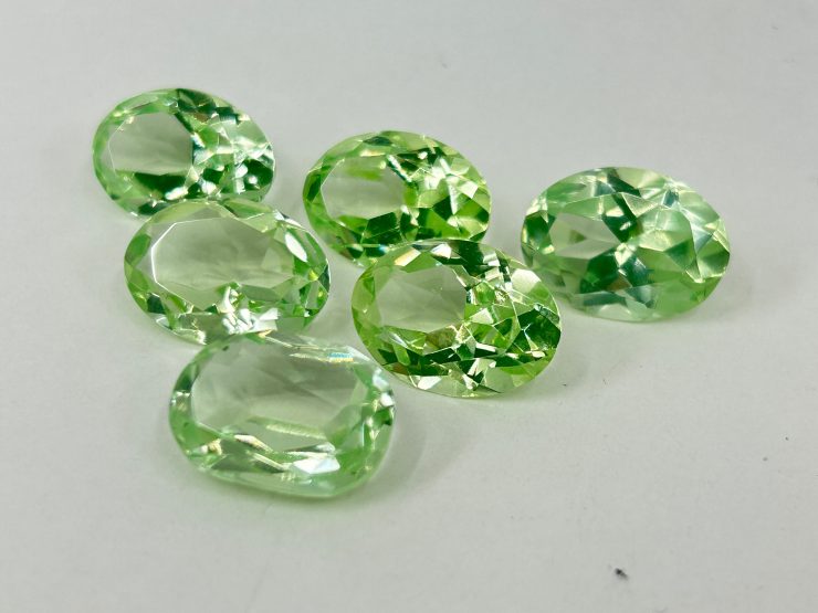 il fullxfull.5865355393 k1kt scaled Peridot Synthetic Corundum Oval Shape Faceted Loose Gemstones in 18x13mm, 20x15mm & 22x16mm for Jewellery Making