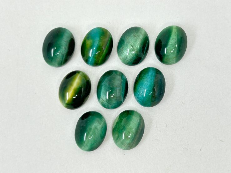 il fullxfull.5978619980 peup scaled 100 Pieces of Green Cats Eye Oval Shape Cabochon Loose Gemstones in 9x7mm for Jewellery Making