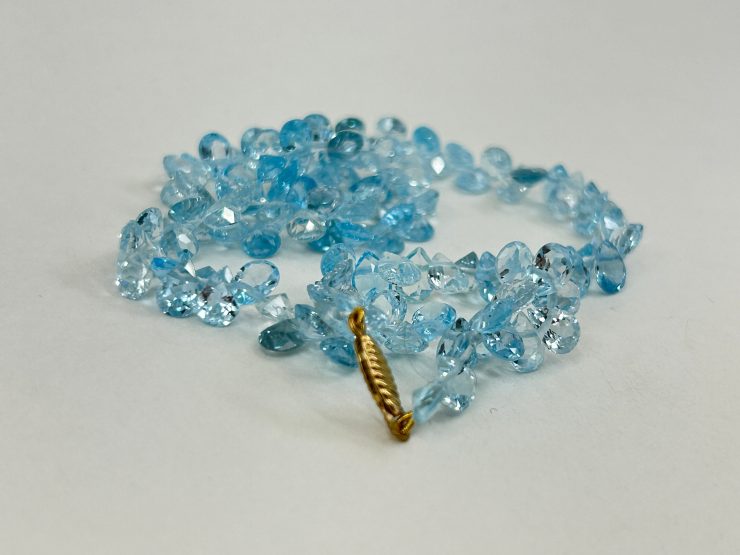 il fullxfull.6025648190 kdbq scaled 17 Inch Faceted Pear Shape Sky Blue Topaz Beaded Necklace (7x5mm Gemstones) with 9 Carat Gold Clasp