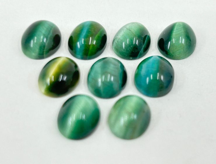 il fullxfull.6026686027 gmci scaled 100 Pieces of Green Cats Eye Oval Shape Cabochon Loose Gemstones in 9x7mm for Jewellery Making